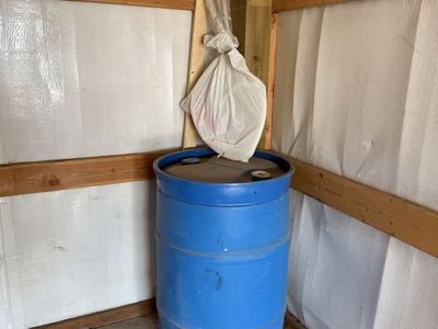 55 gallon drum of kerosine and pump