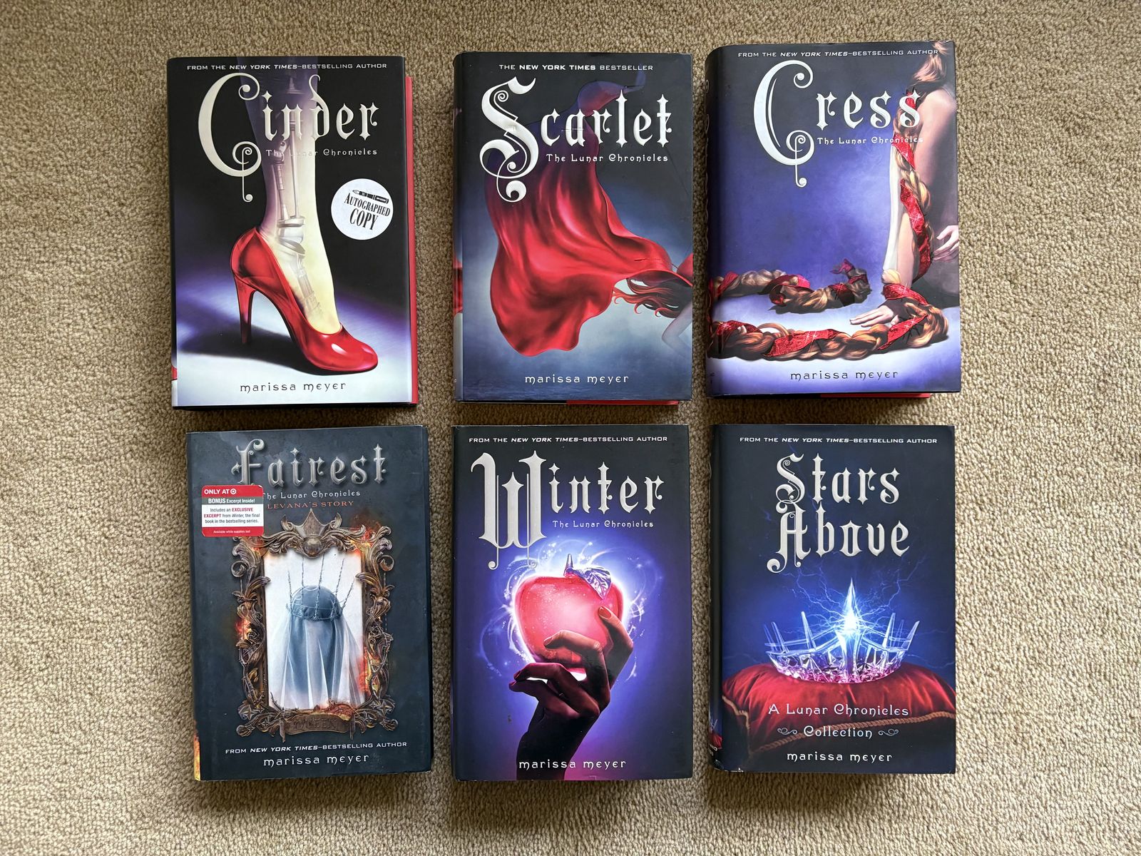 The Lunar Chronicles Complete Series, by Marissa Meyer (hardcovers—ONE SIGNED)