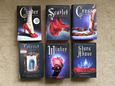 The Lunar Chronicles Complete Series, by Marissa Meyer (hardcovers—ONE SIGNED)