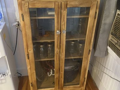 Rustic Wooden Display Cabinet with Glass Doors and Shelves