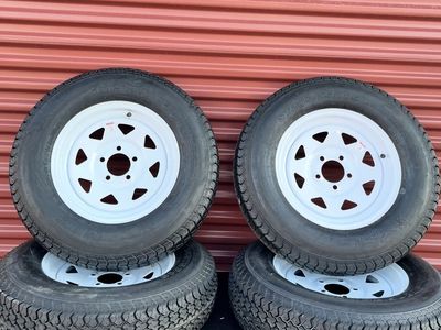 Set of 4 Free Country ST 205/75 D 15 Trailer Tires Mounted on New White Spoke Wheels 5 on 4.5. Brand New