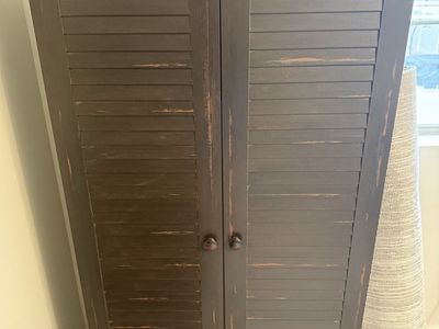 Dark Brown Distressed Wood Armoire Cabinet with Double Louvered Doors and Adjustable Shelves