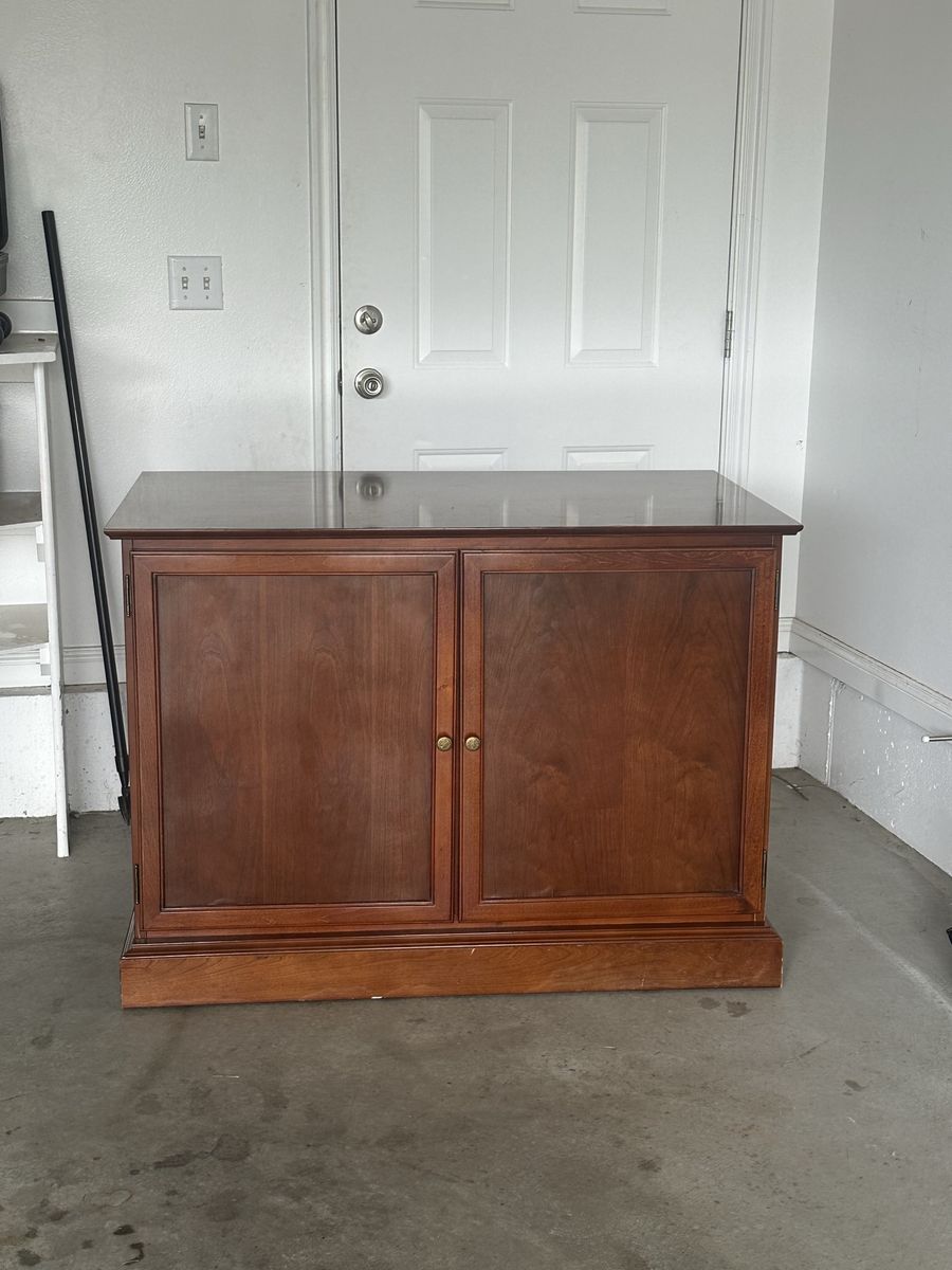 Bombay company cherry wood storage cabinet