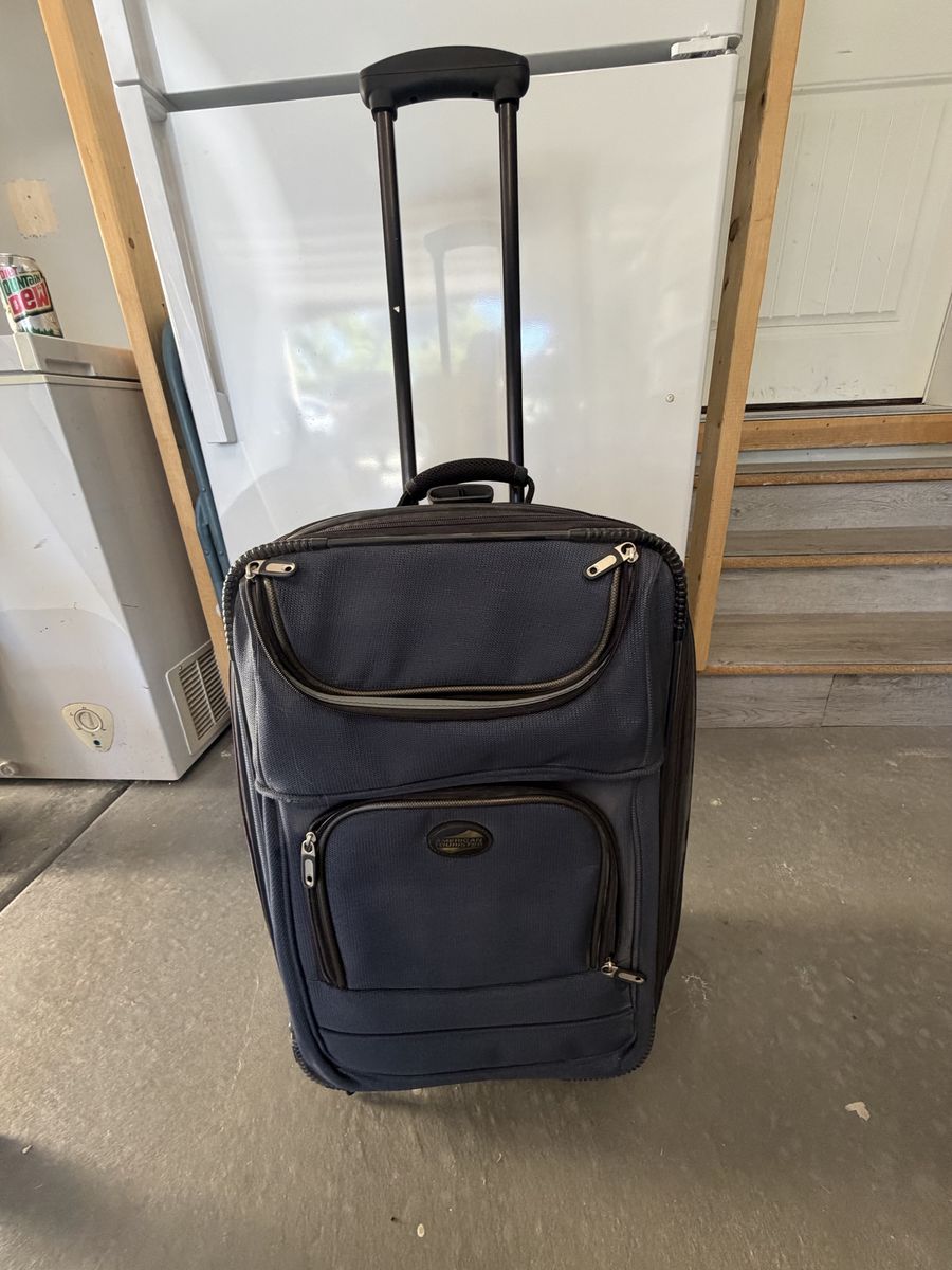 American Tourister Rolling Luggage Suitcase