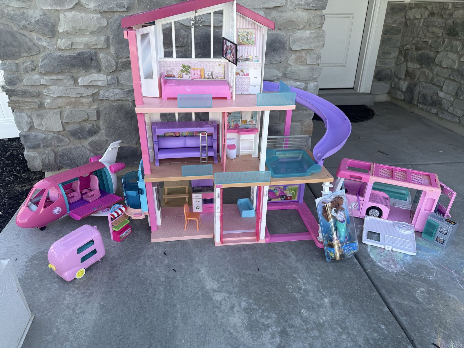 Barbie Dreamhouse Playset Bundle with Airplane, RV, and Doll