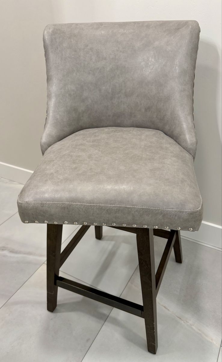 Gray Faux Leather Bar Stool with Nailhead Trim and Dark Wood Base, Swivel Counter Height