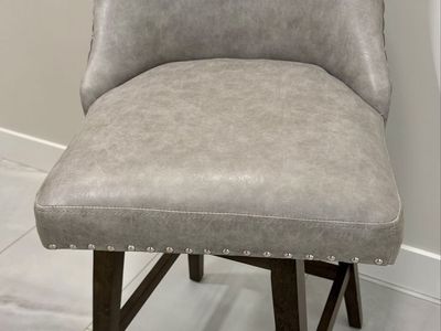 Gray Faux Leather Bar Stool with Nailhead Trim and Dark Wood Base, Swivel Counter Height