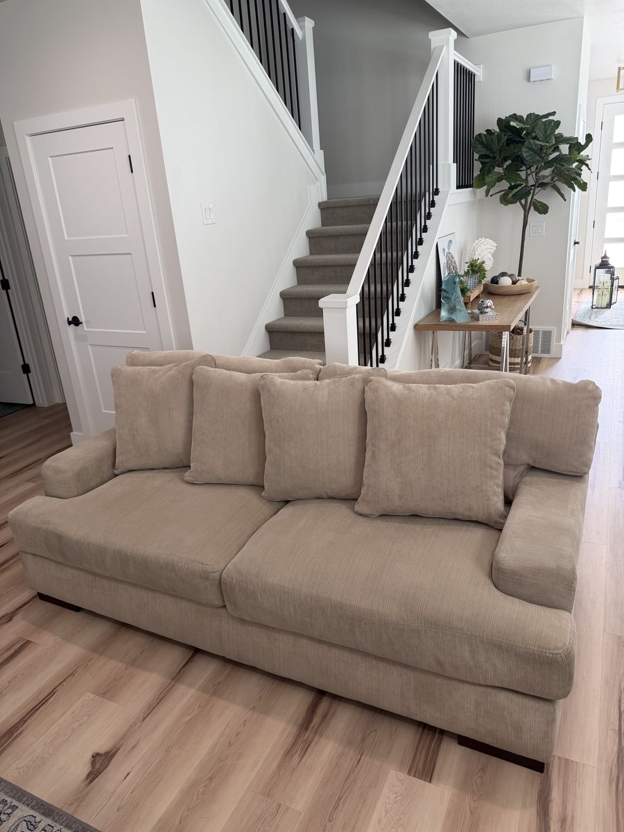 Cream couch with reversible pillows!