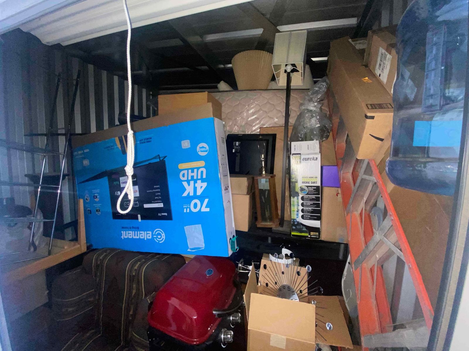 Storage Unit with 70" Element 4K UHD Smart TV, Grill, Furniture, Eureka Vacuum, & More