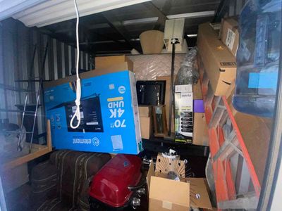 Storage Unit with 70" Element 4K UHD Smart TV, Grill, Furniture, Eureka Vacuum, & More