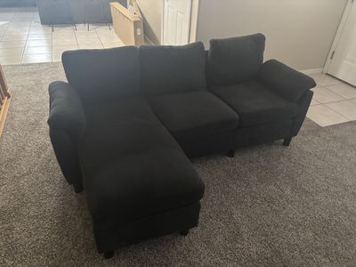 Black couch w/ Ottoman
