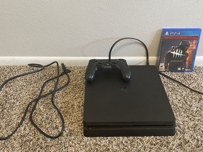 PS4 With Dual Shock Controller & Dead By Daylight Game (Perfect condition & comes with all plugs)