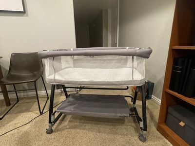 Grey Mesh Bassinet with Wheels/rocker and Storage Shelf
