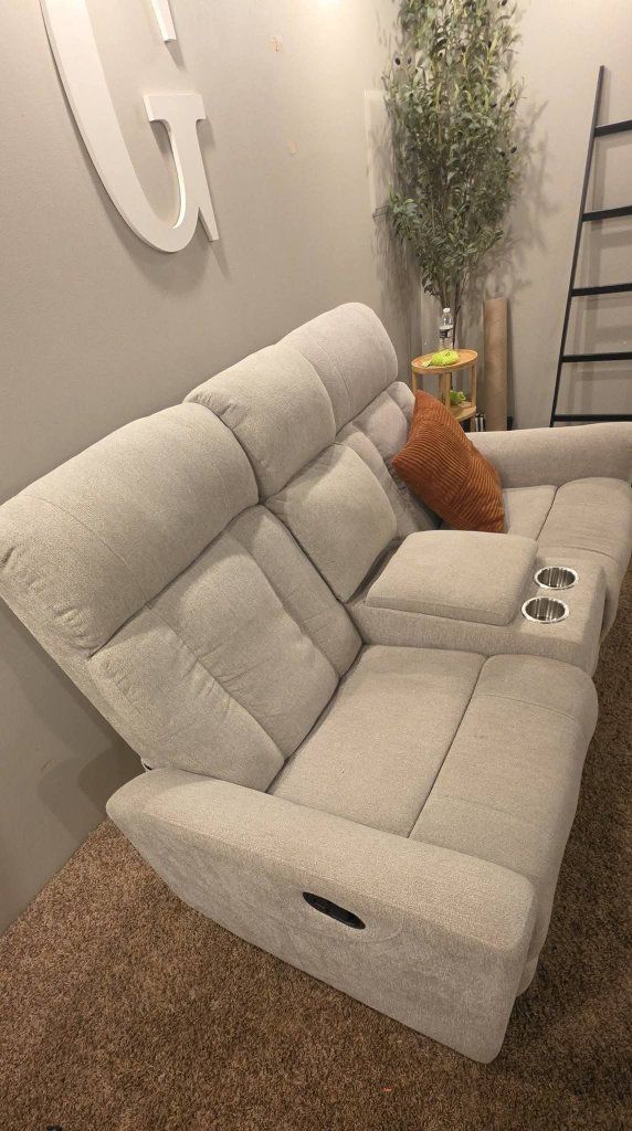 dual recliner couch with console storage