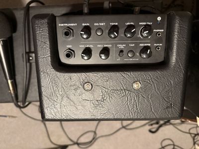 Mighty 8 BT Guitar Amp. Also has vocal input.