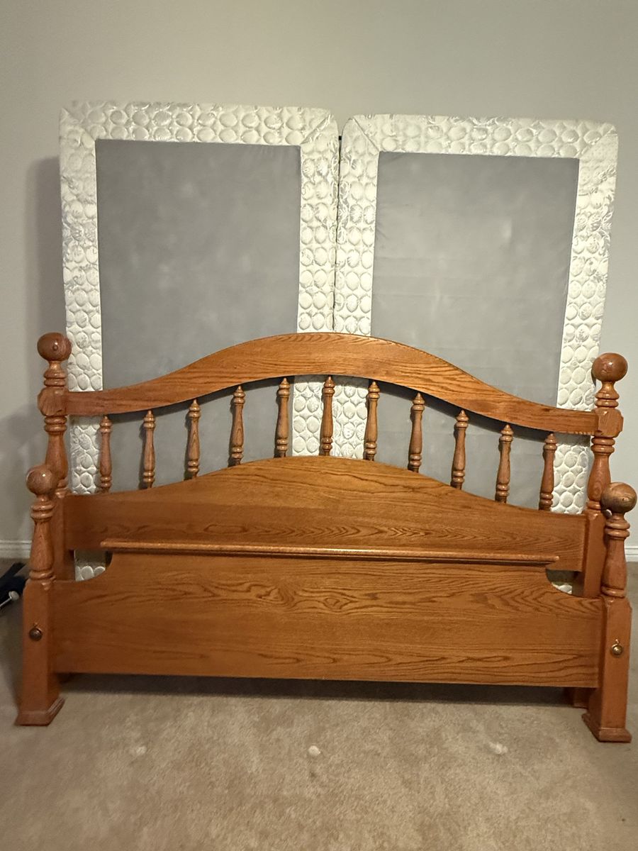 King Size Bed, includes headboard, footboard, box spring, and pillow top mattress.