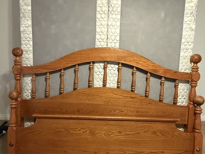 King Size Bed, includes headboard, footboard, box spring, and pillow top mattress.