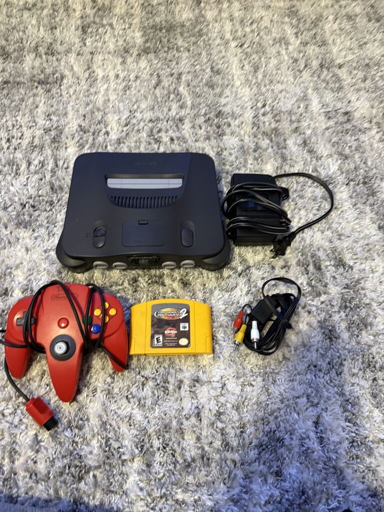 nintendo 64 console with tony hawk game. tested