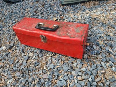 vintage toolbox with tools