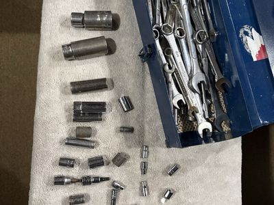 Assorted Combination Wrench Set with Metal Tool Box - Craftsman & Various Brands and also multiple sizes of sockets and toolbox.