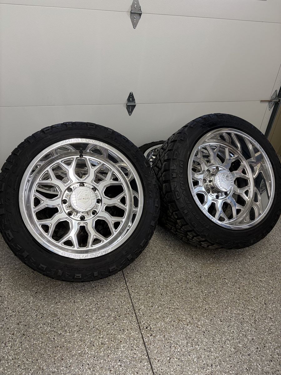 22x12 8x180 Amani forged wheels on 33x12.50R20 Nitto Ridge Grapplers