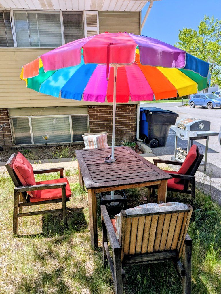 Wooden picnic table with umbrella, chairs and cushions - $200 OBO