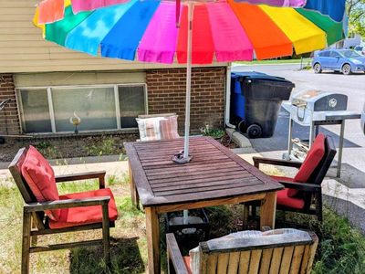 Wooden picnic table with umbrella, chairs and cushions - $200 OBO