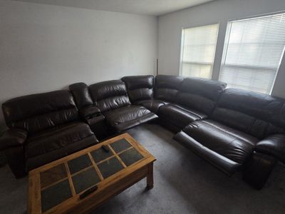 Dark Brown Leather Sectional Sofa with Recliners and Cup Holders