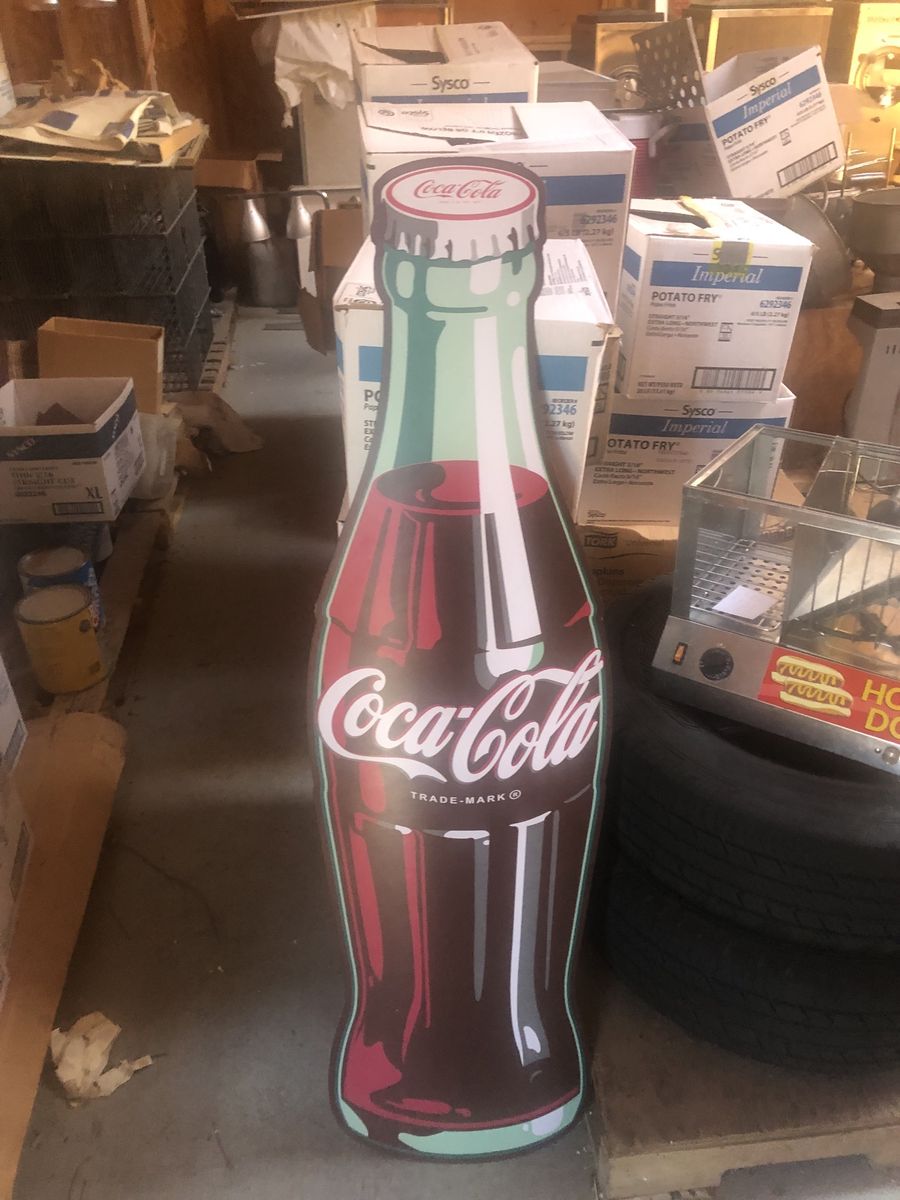 3 Coke signs