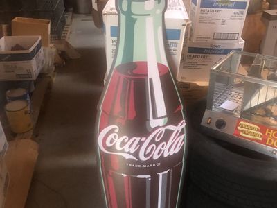 3 Coke signs