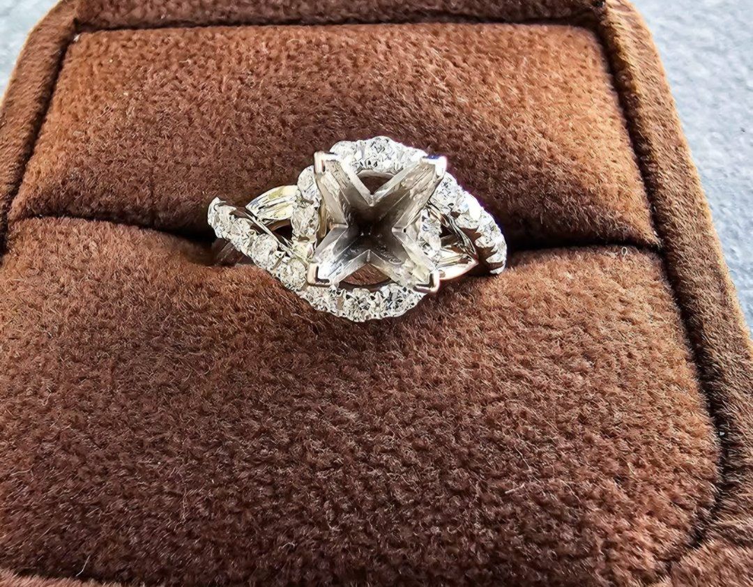 14 Karat white gold 1/2 Karat worth of diamonds