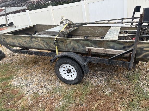 Flat bottom 16X55X18 Boat ( This is a full waterfowl set package 40hp Longtail and a 9.9 Trolling motor )