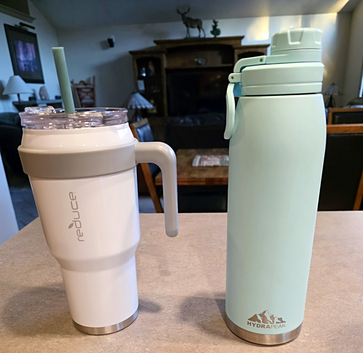 REDUCE and HYDRAPEAK water jugs. Excellent condition BOTH for $12