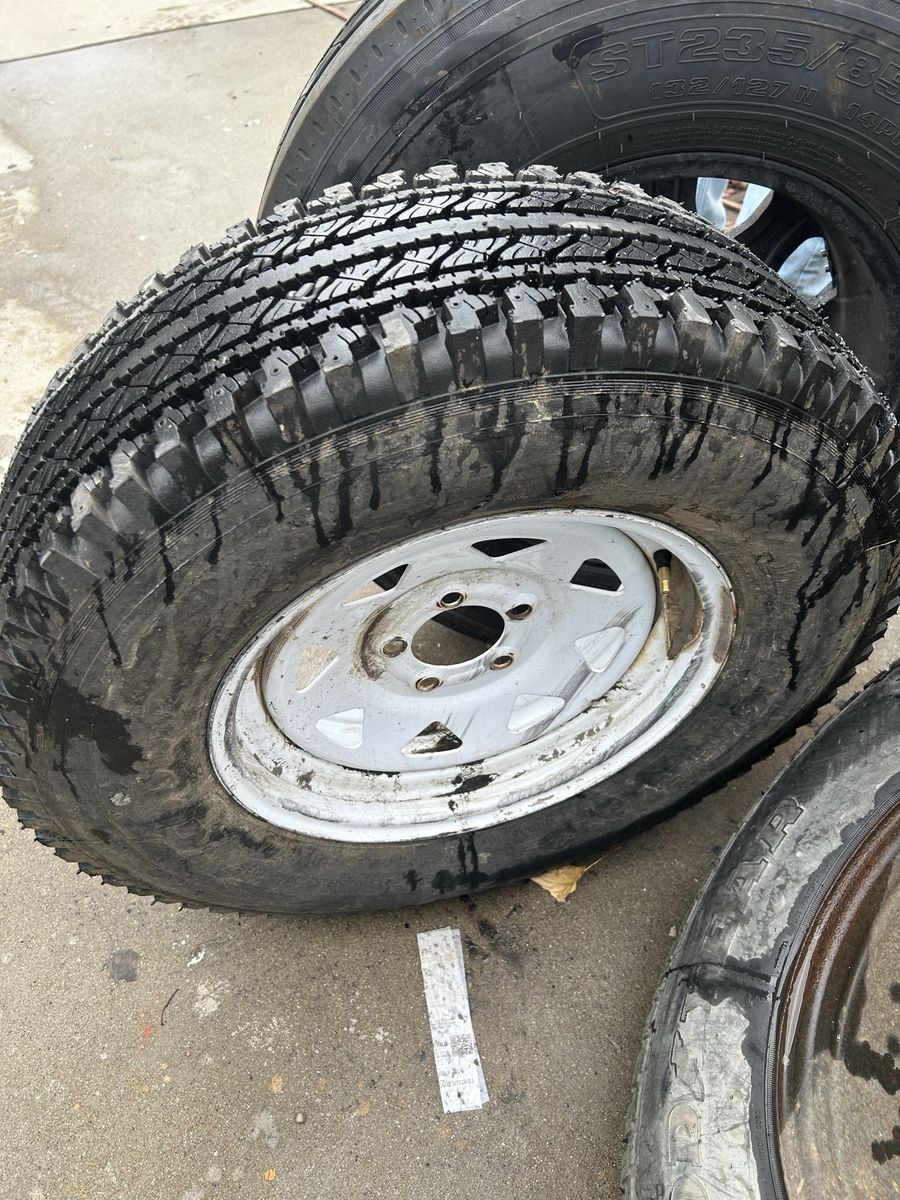 Goodyear Wrangler LT Tire Mounted on White Steel Wheel