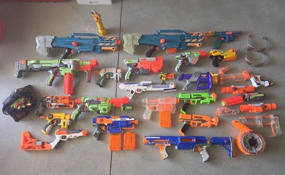 Large Nerf Blaster Lot: 20+ N-Strike Elite & Zombie Strike Blasters, Darts, and Accessories