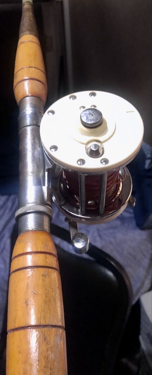 Vintage Wooden Fishing Rod with White Spool Reel - Classic Collectible Fishing Gear