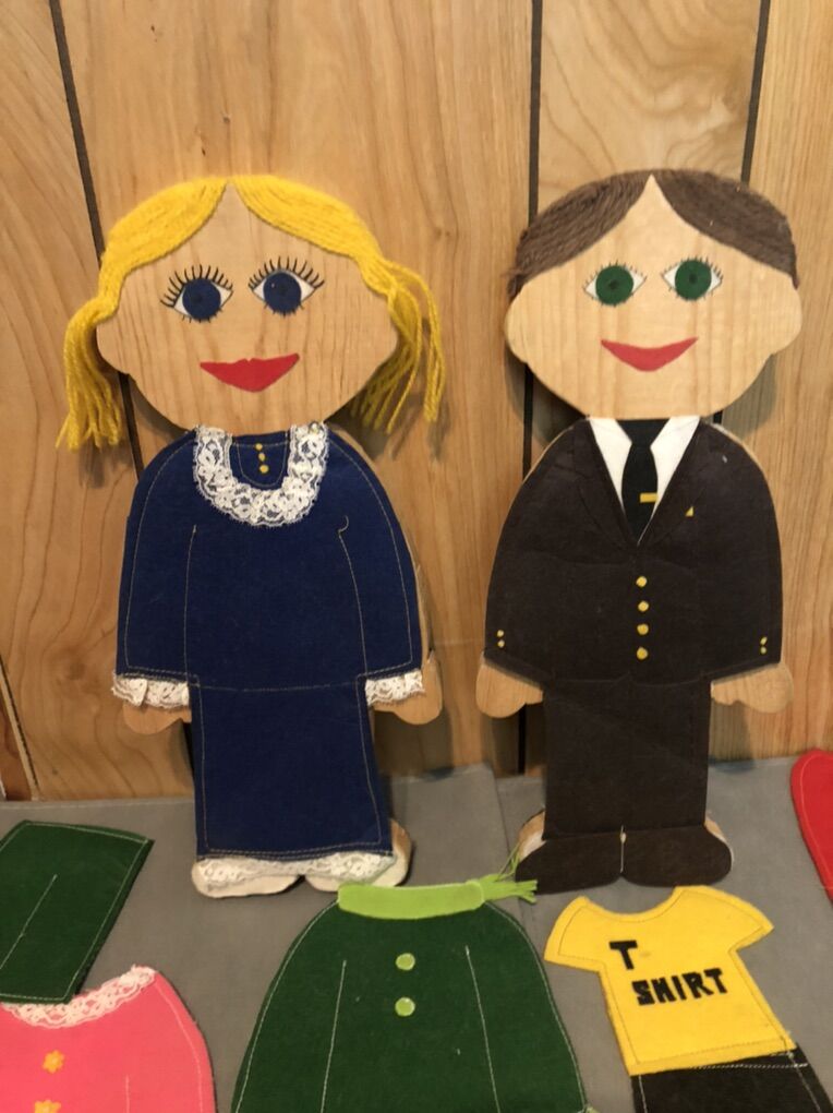 Dressing Wooden Learning Dolls