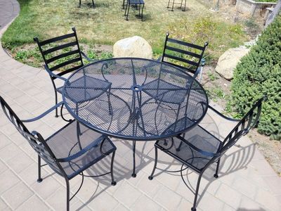 wrought iron patio dining table and 4 chairs