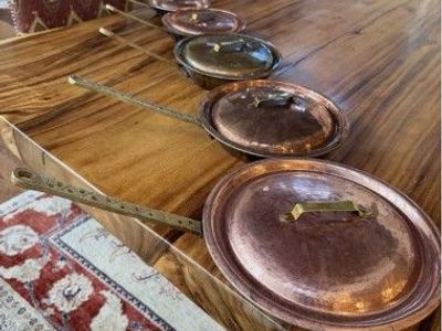 Ali’s Copper Shop. Copper pan and pot set.
