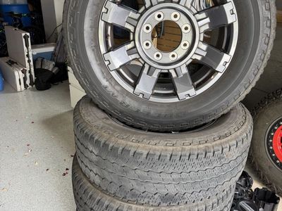 Bridgestone Dueler A/T LT275/65R20 Tires & Wheels for Ford F-350Set of 4)