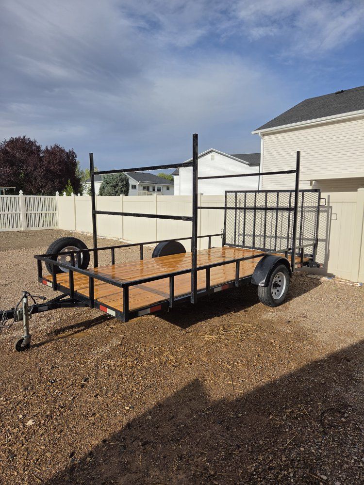 Utility Trailer with Ladder  ramp gate, kayak rack and misc material  hauling kit- Used Good