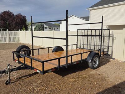 Utility Trailer with Ladder ramp gate, kayak rack and misc material hauling kit- Used Good