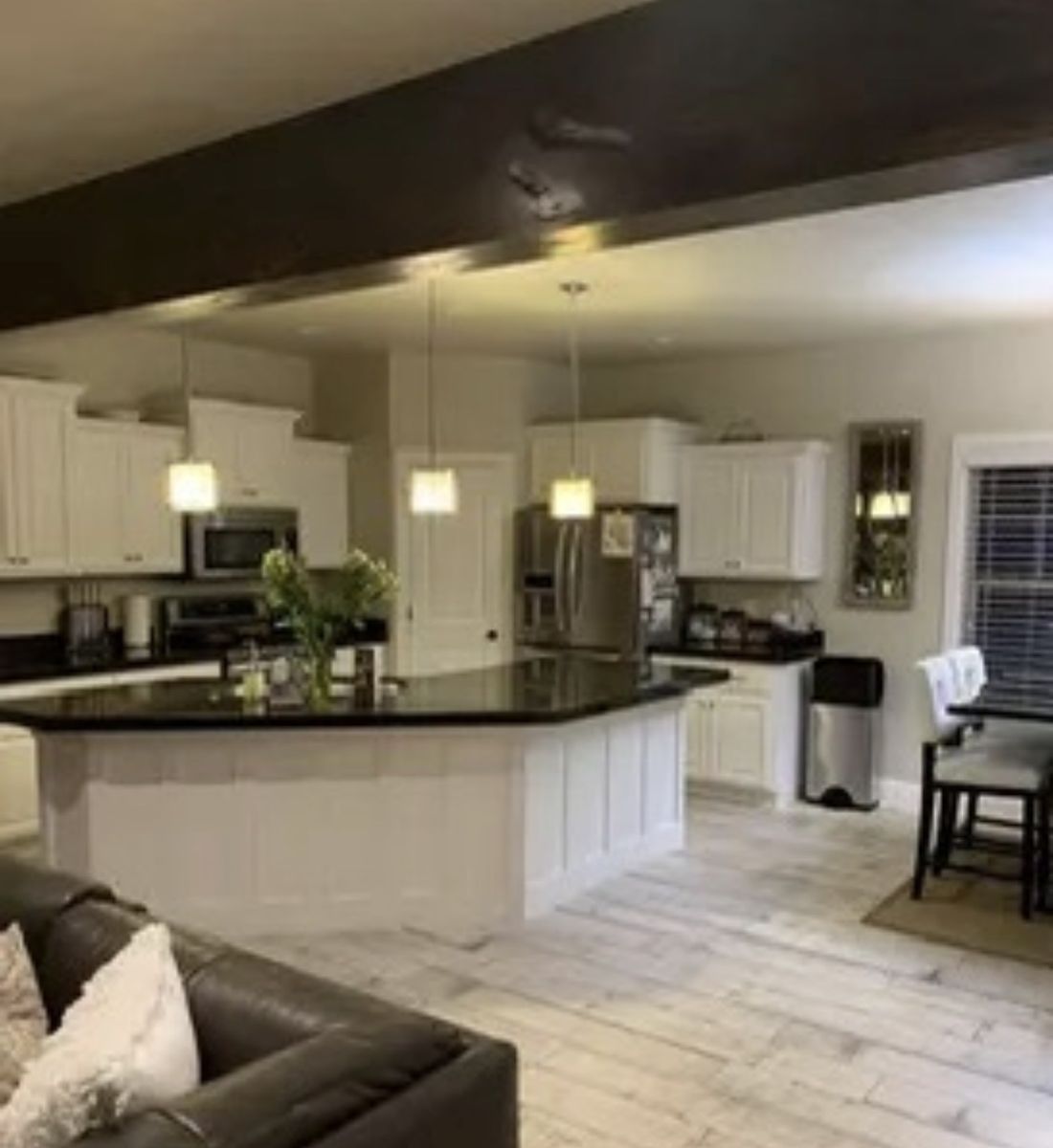 Granite counters and white cabinets
