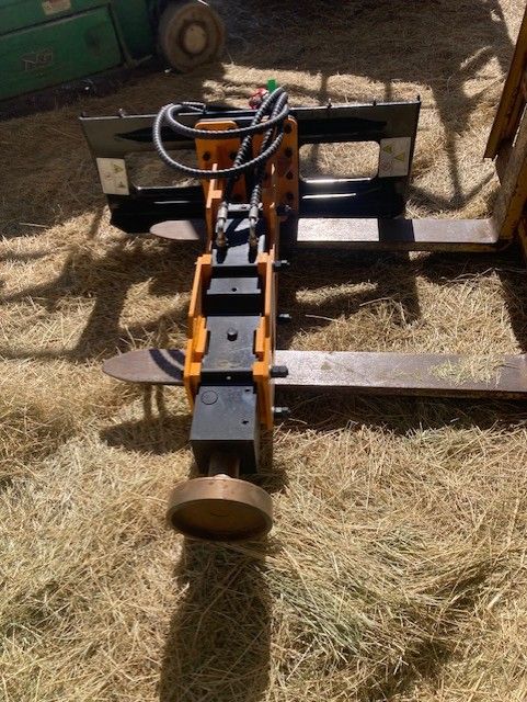 Skid steer post pounder