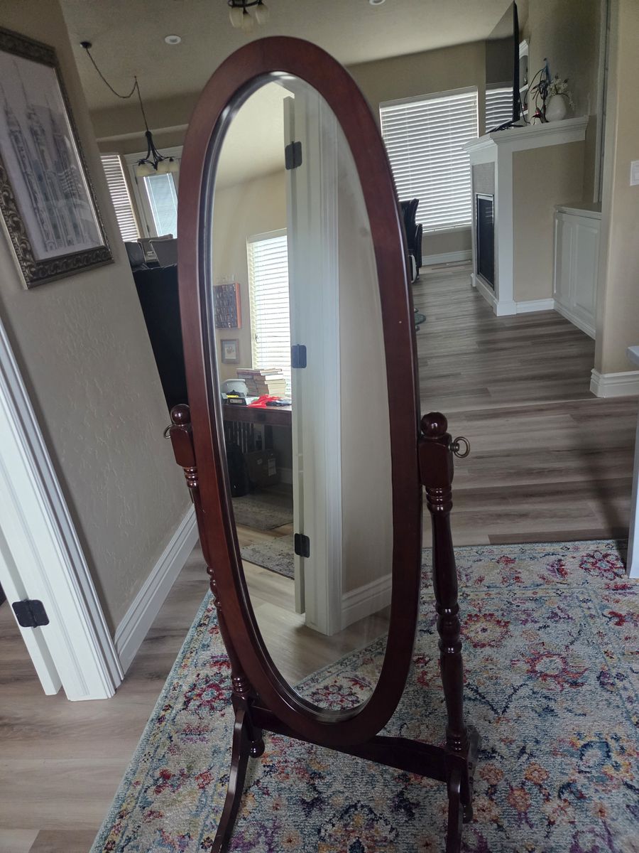 Oval bedroom mirror