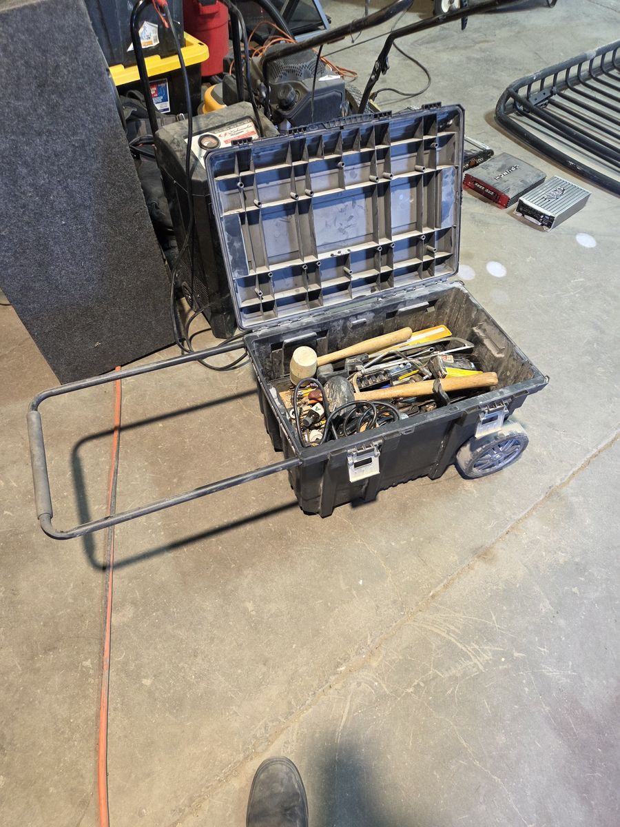 Tool box on wheels full of tools