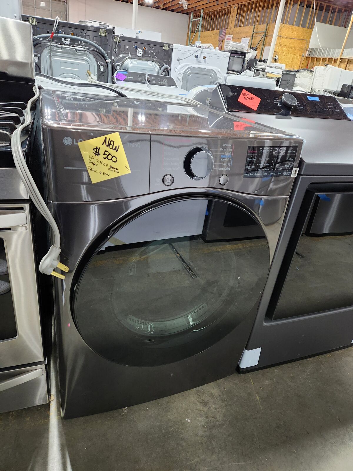STUNNING BRAND NEW! LG THINQ 7.4 CF FRONTLOAD ELECTRIC DRYER!