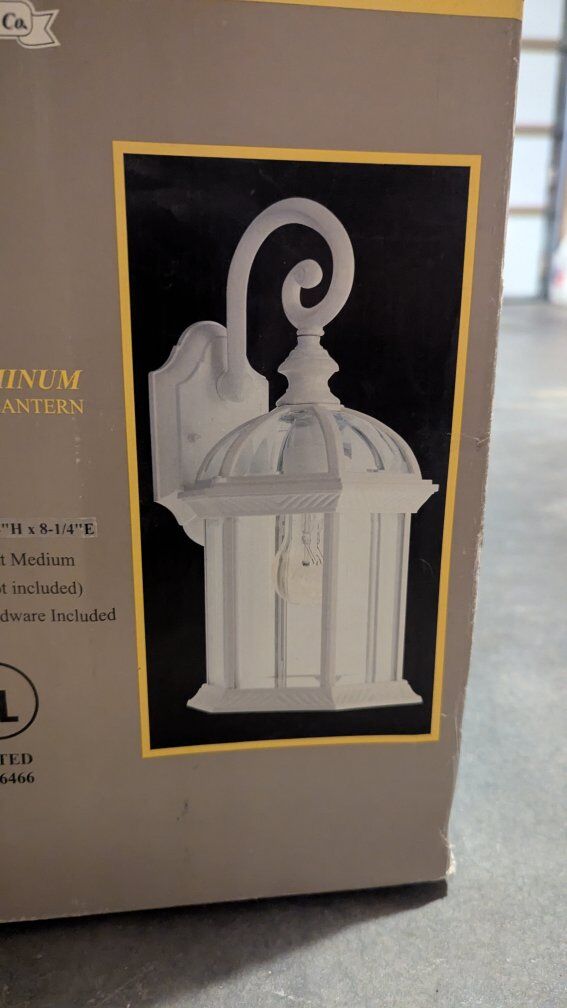 2 White Hampton Bay outdoor lights.