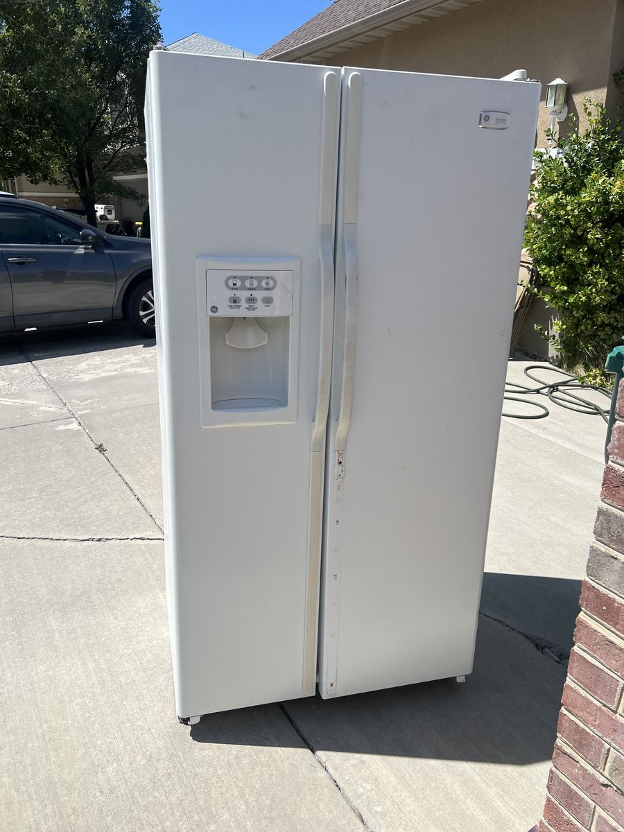 Free fridge, located Cedar Hills