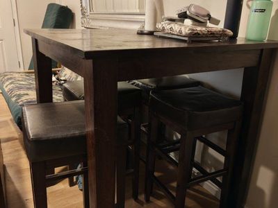 bar height dining table with stools